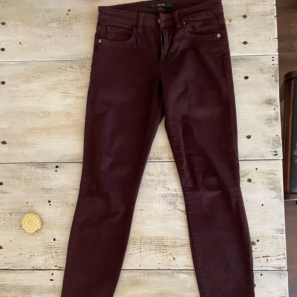 Joe’s mid waist maroon stretch jeans